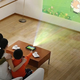 Illustration for article titled Stuffing a Projector in a Tablet Might Actually Be Awesome